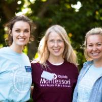 Groundswell staff smiling with Sprout Teacher of the Year Award winner.